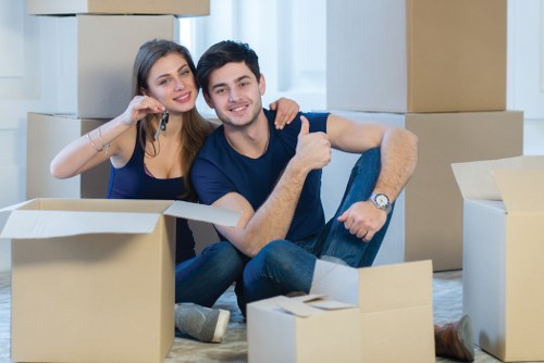 Professional movers assisting with a home move in London
