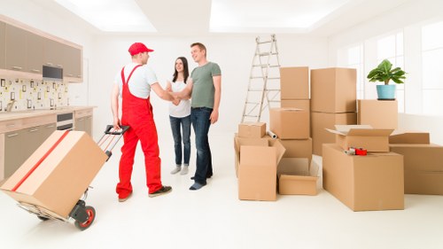Loading furniture into a van for a London move